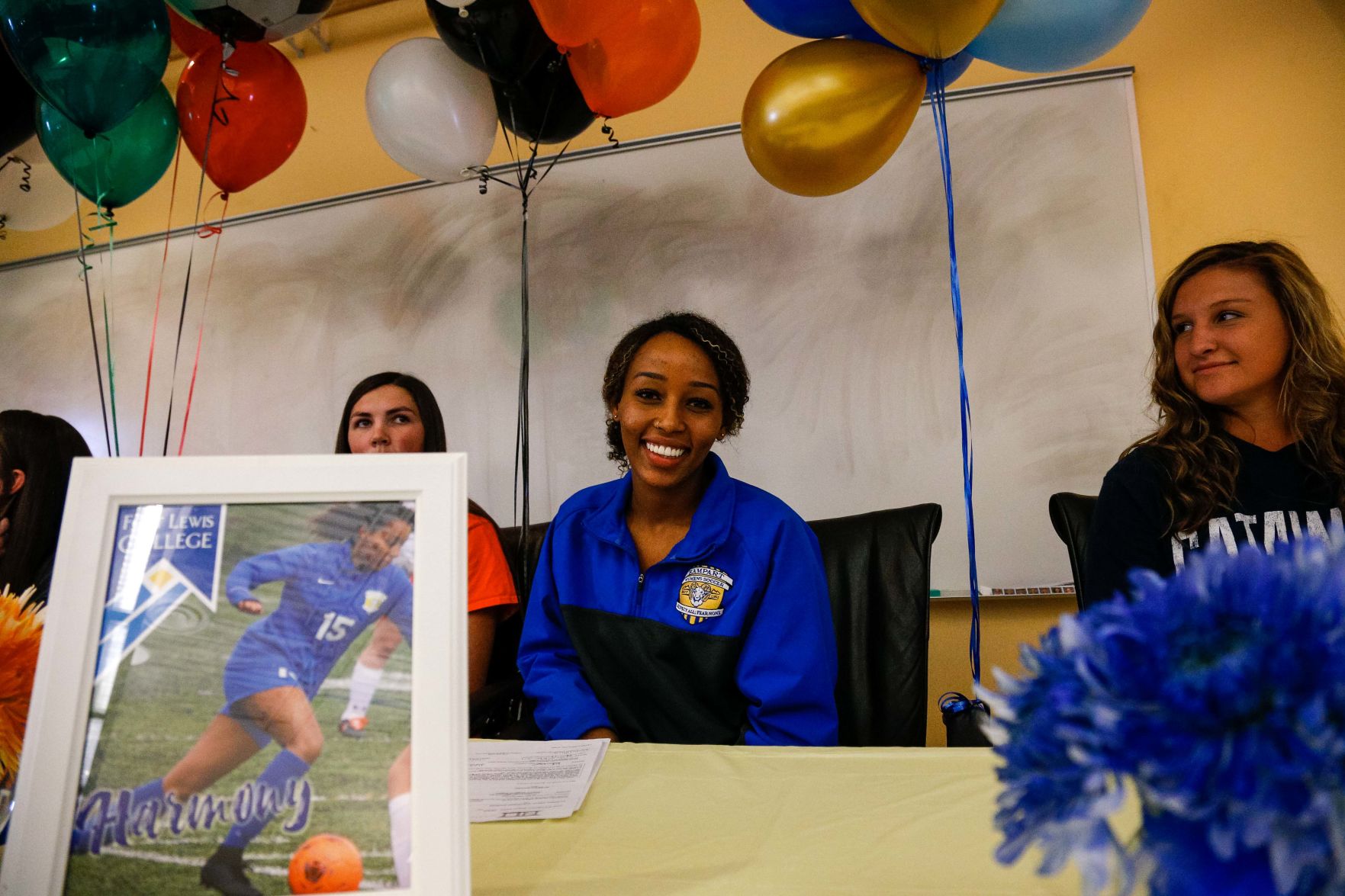 SIGNING DAY: Rampart athletes sign their National Letter of Intent
